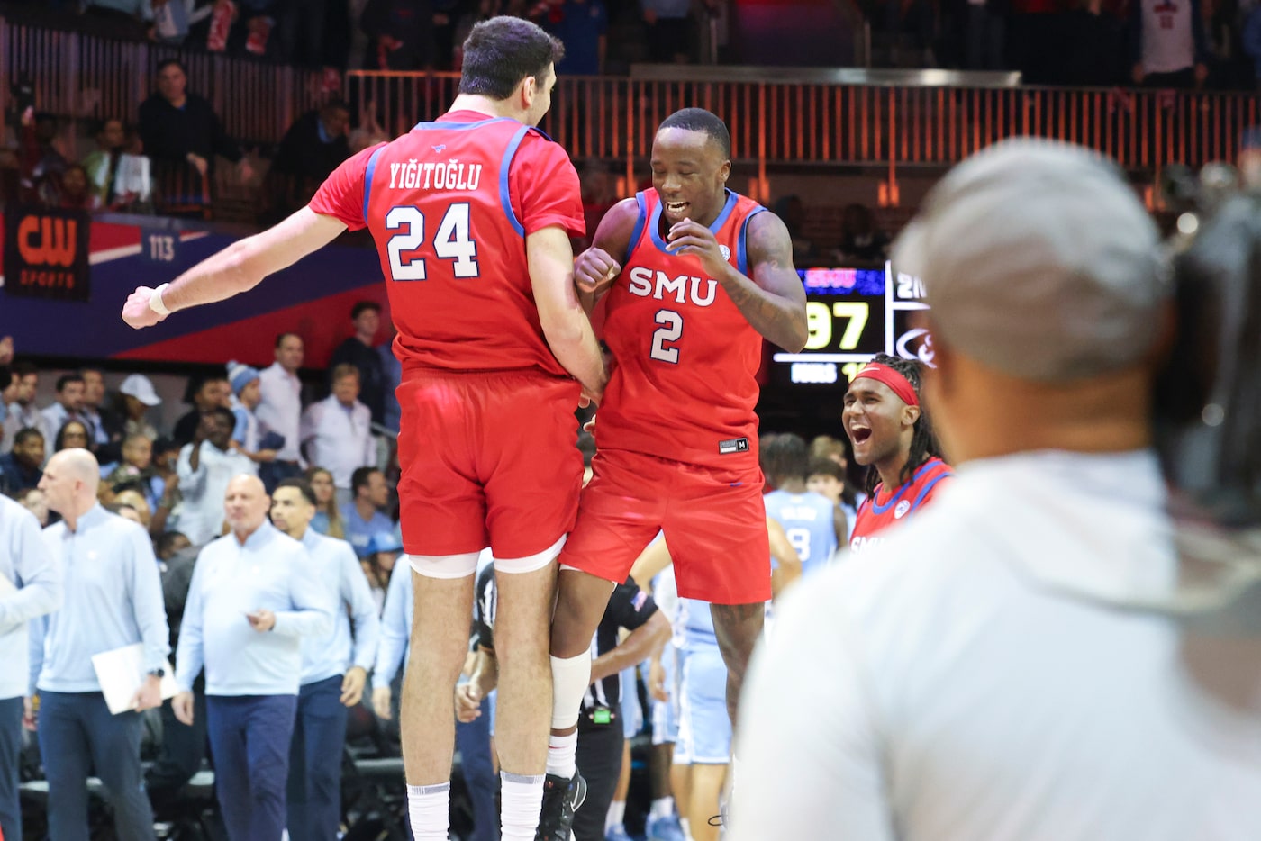 Southern Methodist University center Samet Yigitoglu (24) and guard Boopie Miller (2)...