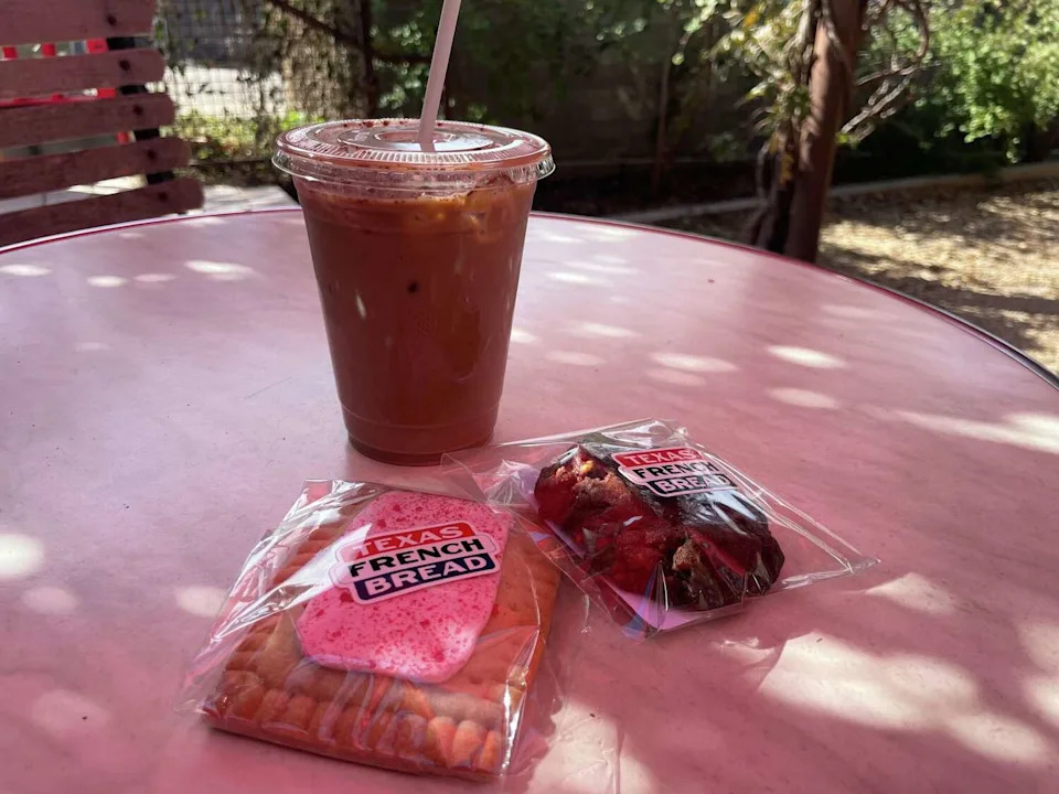Texas French Bread, located at the intersection of 29th and Rio Grande streets in Austin, is set to reopen this spring, more than four years after a devastating fire. Pictures are Texas French Bread's iced Mexican mocha, a strawberry pastry pocket and a mocha walnut cookie. (Kelsey Thompson/MySA)
