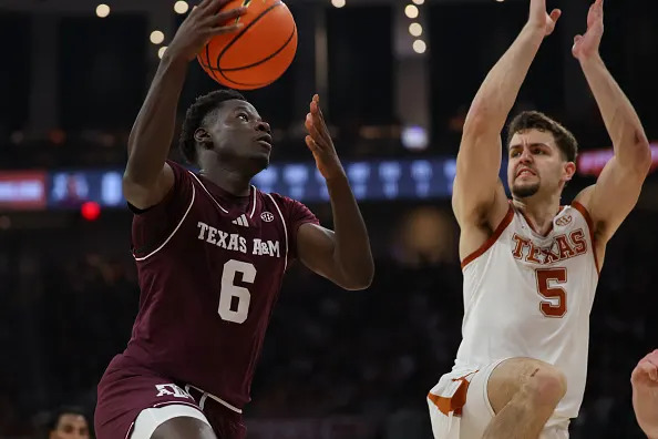 AUSTIN, TX – JANUARY 17: Guard Ali Dibba #6 of the Texas A&M Aggies goes up for a shot while being defended by forward Camden Heide #5 of the Texas Longhorns during the SEC college basketball game between Texas Longhorns and Texas A&M Aggies on January 17, 2026, at Moody Center in Austin, TX. (Photo by David Buono/Icon Sportswire via Getty Images)