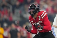 Texas Tech defensive end Romello Height (9) reacts after a play during the Big 12 Conference...
