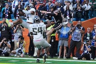 Oregon defensive back Brandon Finney (4) intercepts a pass intended for Texas Tech wide...