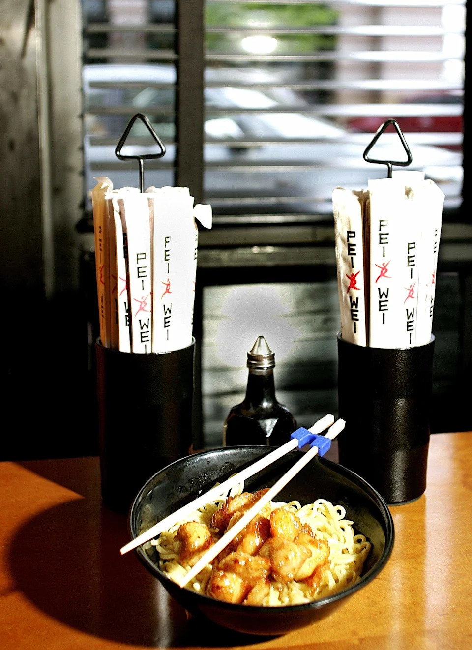 Bowl of Honey Seared Chicken and noodles at Pei Wei in Montgomery Plaza. Photo taken Monday April 19, 2010.