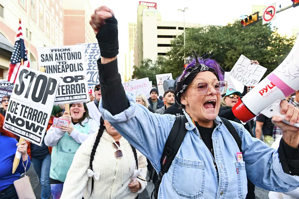 Protesters march through downtown San Antonio on Saturday, Jan. 10, 2026, to denounce U.S. Immigration and Customs Enforcement and to protest the fatal shooting of Renee Nicole Good, a Minneapolis woman who was shot and killed by an ICE agent earlier this week. Good's death has sparked demonstrations and calls for accountability in multiple cities (Charlie Blalock/Contributor)