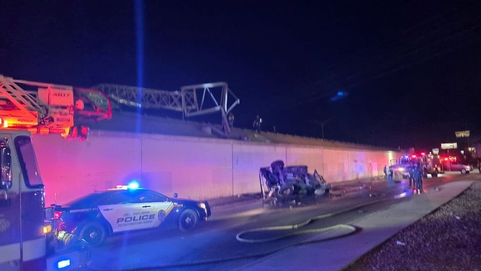 Vehicle rollover causes fire on I-10 east, highway sign knocked down in crash (credit: George Cruz)