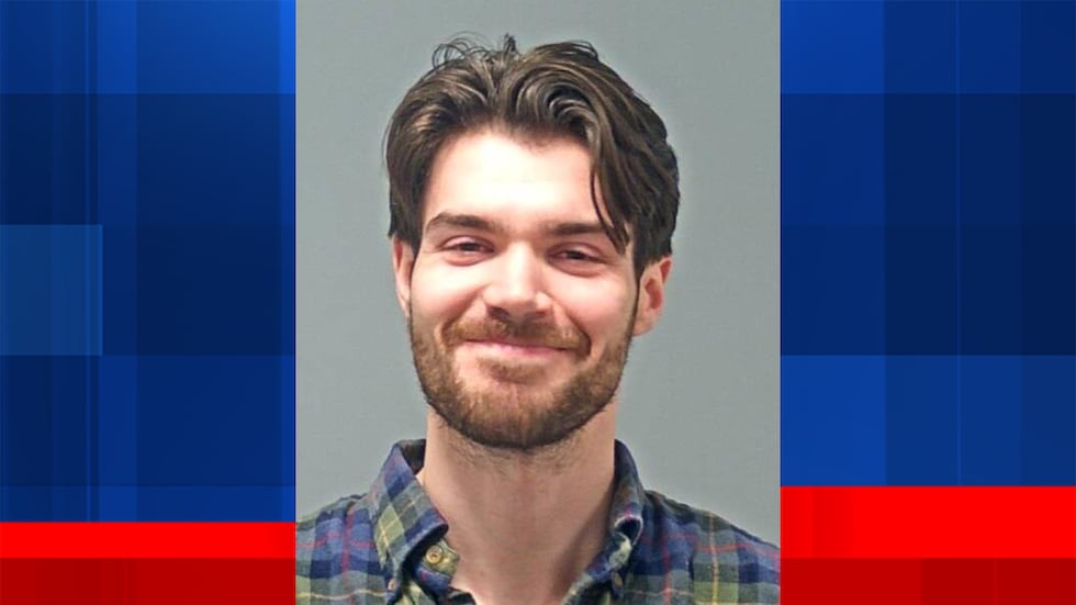 Dallas Taulbee, 25, is facing two charges: aggravated arson and arson.