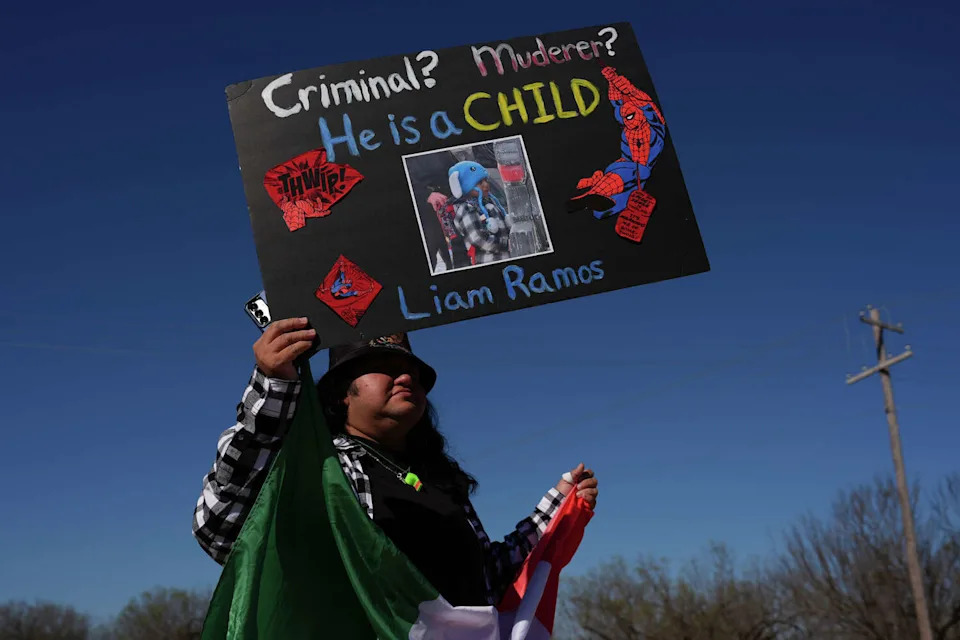 Protesters gather outside the South Texas Family Residential Center detention facility where Liam Ramos and his father are being detained in Dilley, Texas, Wednesday, Jan. 28, 2026. (AP Photo/Eric Gay) (Eric Gay/AP)