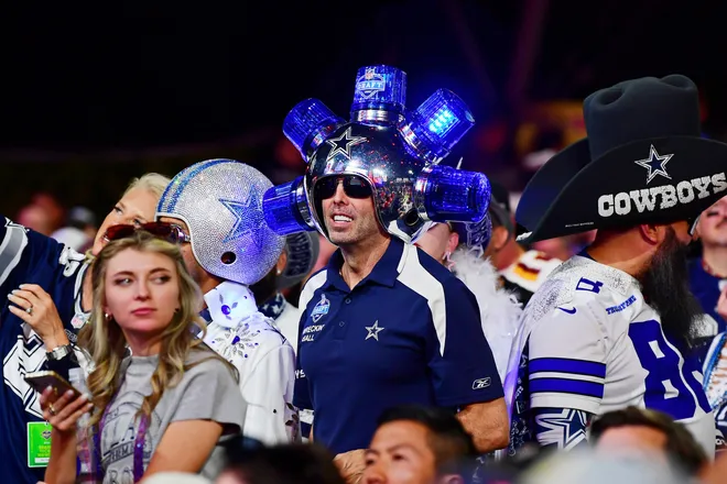 Apr 28, 2022; Las Vegas, NV, USA; Dallas Cowboys fans during the first round of the 2022 NFL Draft at the NFL Draft Theater. Mandatory Credit: Gary Vasquez-USA TODAY Sports