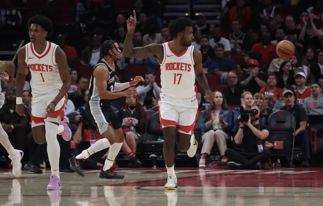 Oct 17, 2024; Houston, Texas, USA; Houston Rockets forward Tari Eason (17) reacts to his basket against the San Antonio Spurs in the second quarter at Toyota Center. Mandatory Credit: Thomas Shea-Imagn Images
