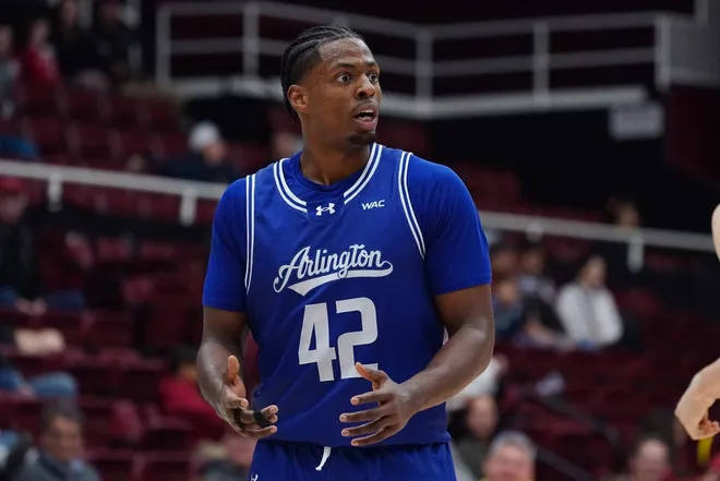 Dec 17, 2025; Stanford, California, USA; Texas-Arlington Mavericks guard Marcell McCreary (42) reacts with surprise to a referee's call during the game against the Stanford Cardinal in the first half at Maples Pavilion.