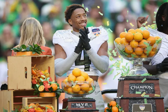 MIAMI GARDENS, FLORIDA - JANUARY 01: Brandon Finney #4 of the Oregon Ducks celebrates after defeating the Texas Tech Red Raiders 23-0 in the 2025 College Football Playoff Quarterfinal at the Capital One Orange Bowl at Hard Rock Stadium on January 01, 2026 in Miami Gardens, Florida. (Photo by James Gilbert/Getty Images)
