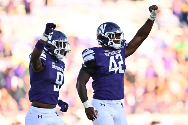 Sep 9, 2023; Evanston, Illinois, USA; Northwestern Wildcats defensive lineman Anto Saka (42) celebrates after holding the University of Texas El Paso Miners on downs in the second half at Ryan Field. Mandatory Credit: Jamie Sabau-USA TODAY Sports