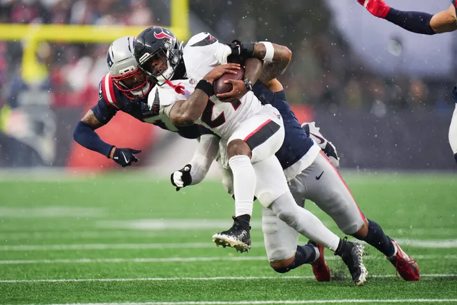 Jan 18, 2026; Foxborough, MA, USA; Houston Texans running back Woody Marks (27) carries the ball in the first half against the New England Patriots in an AFC Divisional Round game at Gillette Stadium. Mandatory Credit: David Butler II-Imagn Images