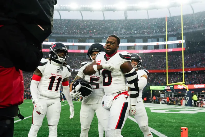 Jan 18, 2026; Foxborough, MA, USA; Houston Texans linebacker Azeez Al-Shaair (0). safety Jalen Pitre (5) and cornerback Tremon Smith (11), right to left, pose for a photo in the first half in an AFC Divisional Round game against the New England Patriots at Gillette Stadium. Mandatory Credit: David Butler II-Imagn Images