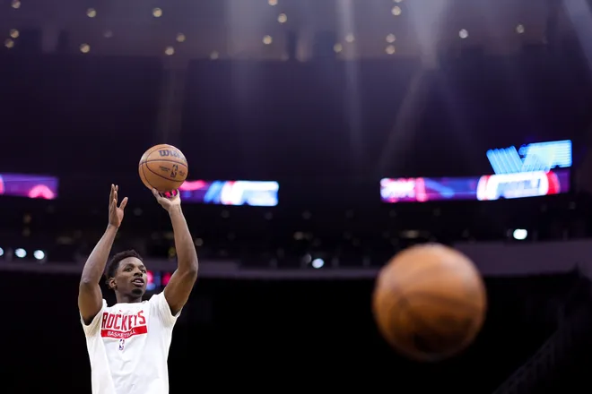 HOUSTON, TEXAS - DECEMBER 23: Jae'Sean Tate #8 of the Houston Rockets takes practice shots during a warm up prior to a game at Toyota Center on December 23, 2022 in Houston, Texas. NOTE TO USER: User expressly acknowledges and agrees that, by downloading and or using this photograph, User is consenting to the terms and conditions of the Getty Images License Agreement. (Photo by Carmen Mandato/Getty Images)