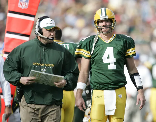 October 8, 2006; Green Bay, WI, USA; Green Bay Packers head coach Mike McCarthy (left) talks with quarterback (4) Brett Favre during the fourth quarter against the St. Louis Rams at Lambeau Field. Mandatory Credit: Photo By Jeff Hanisch-USA TODAY Sports Copyright (c) 2006 Jeff Hanisch