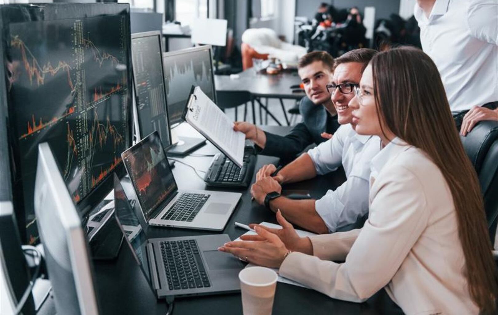 Image shows stock photo of people working on stock market " style=" height:1080px; width:1620px" _languageinserted="true" src="https://cdn.prod.web.uta.edu/-/media/8b7ed3d9c38e4d729d8bfff485f24863.jpg