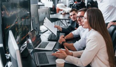 Image shows stock photo of people working on stock market " style=" height:1080px; width:1620px" _languageinserted="true" src="https://cdn.prod.web.uta.edu/-/media/8b7ed3d9c38e4d729d8bfff485f24863.jpg