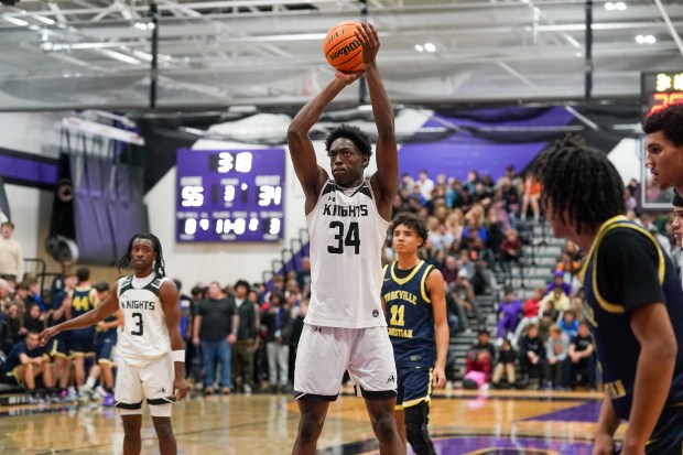 Kaneland's Jeffrey Hassan (34) shoots a free throw against Yorkville Christian during a Plano Christmas Classic Final game in Plano on Tuesday, Dec. 30, 2025. (Sean King / For The Beacon-News)