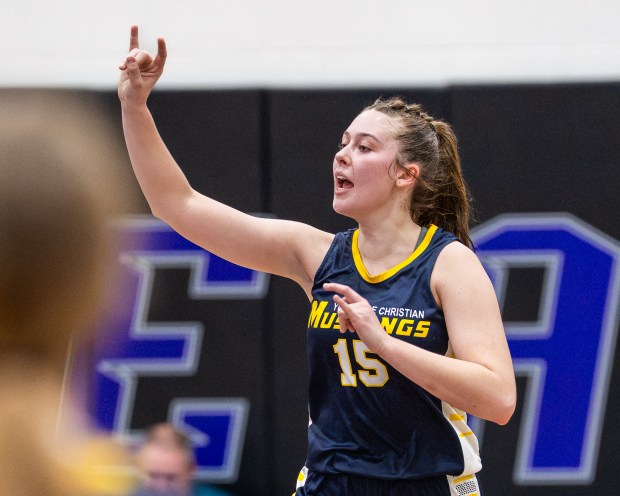 Yorkville Christian's Payton Wallin (15) communicates the offensive play call to her teammates against Plano during a nonconference game in Plano on Wednesday, Jan. 7, 2026. (Jeremy Toney / for the The Beacon-News)