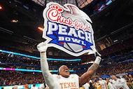 Texas linebacker Morice Blackwell Jr. (37) celebrated victory after a quarterfinals College...