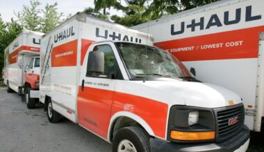 In this June 14, 2006 file photo are U-Haul trucks sitting on a dealer lot in Des Moines, Iowa. (AP Photo/Charlie Neibergall)