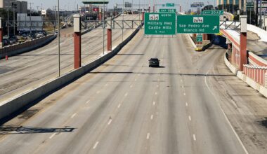 A police vehicle travels along a closed 10-lane section of Interstate 410, Friday, Feb. 19, 2021, in San Antonio. Many roads, highways and interstates remain closed to to icy conditions. (AP Photo/Eric Gay)