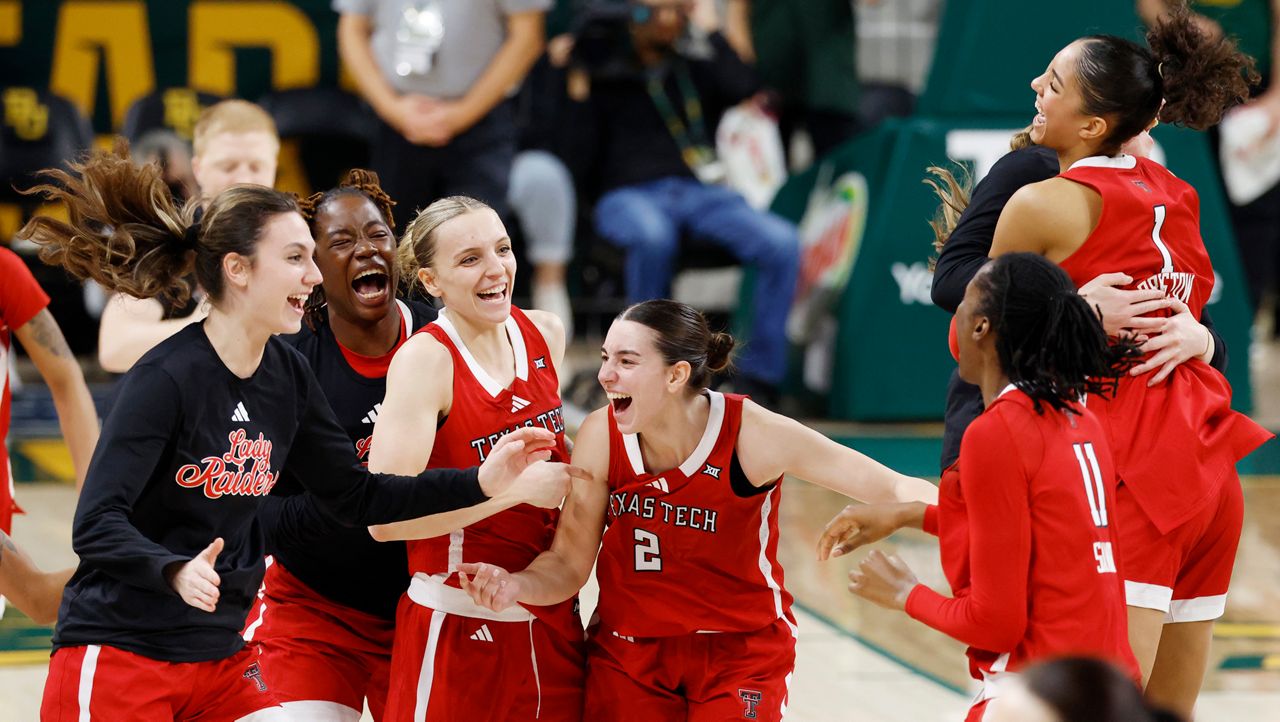 Texas Tech players celebrate on the court after defeating Baylor in an NCAA college basketball game, Sunday, Dec. 21, 2025, in Waco, Texas. (Chris Jones/Waco Tribune-Herald via AP)