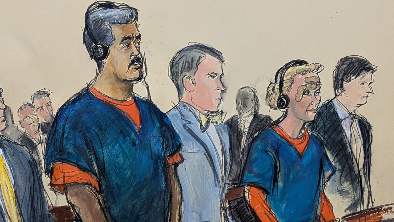 Venezuelan President Nicolas Maduro, left, and his wife, Cilia Flores, second from right, appear in Manhattan federal court with their defense attorneys Mark Donnelly, second from left, and Andres Sanchez, Monday, Jan. 5, 2026, in New York. (Elizabeth Williams via AP)