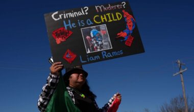 Protesters gather outside the South Texas Family Residential Center detention facility where Liam Ramos and his father are being detained in Dilley, Texas, Wednesday, Jan. 28, 2026. (AP Photo/Eric Gay)