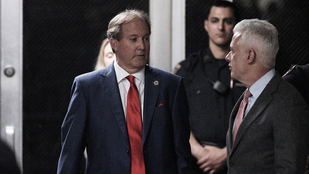 Texas Attorney General Ken Paxton arrives with former President Donald Trump at Manhattan criminal court before Trump's trial in New York, Tuesday, April 30, 2024. (Curtis Means/Pool Photo via AP)