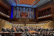 The Dallas Symphony Orchestra on the Meyerson Symphony Center stage before a concert led by...