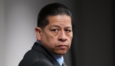 Former Uvalde school district police officer Adrian Gonzales arrives in the courtroom at the Nueces County Courthouse in Corpus Christi, Texas, Tuesday, Jan. 6, 2026. (AP Photo/Eric Gay, Pool)