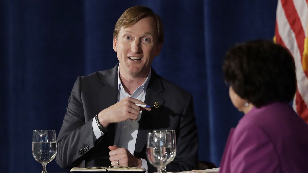Texas Democratic gubernatorial candidates Andrew White, left, and Lupe Valdez, right, take part in a debate, Friday, May 11, 2018, in Austin, Texas, ahead of the state's May 22 primary runoff election. (AP Photo/Eric Gay)
