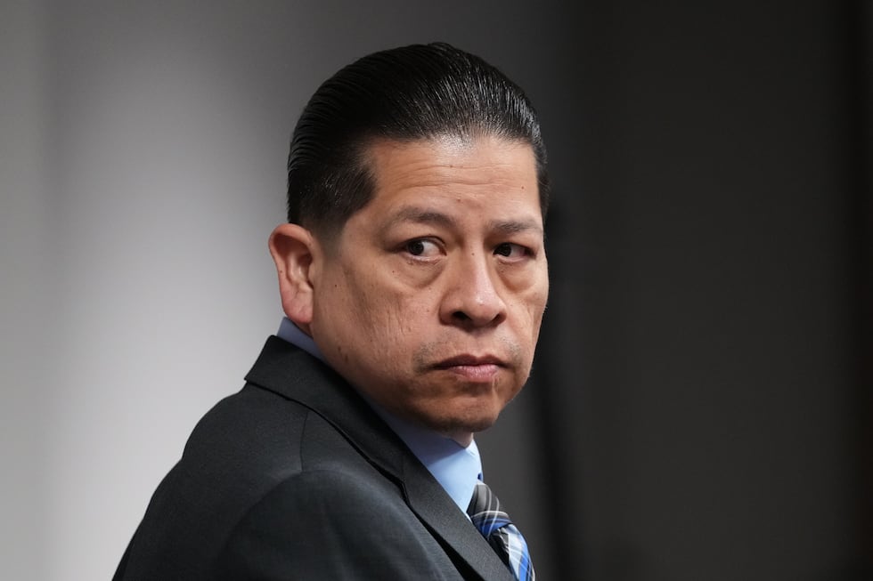 Former Uvalde school district police officer Adrian Gonzales arrives in the courtroom at the...