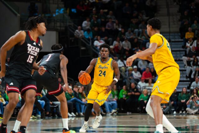 Freshman guard Tounde Yessoufou powers the ball forward at the top of the key. Brady Harris | Photographer