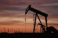 A file photo shows a pumpjack working at dawn in the Permian Basin in Andrews, Texas. (Photo...
