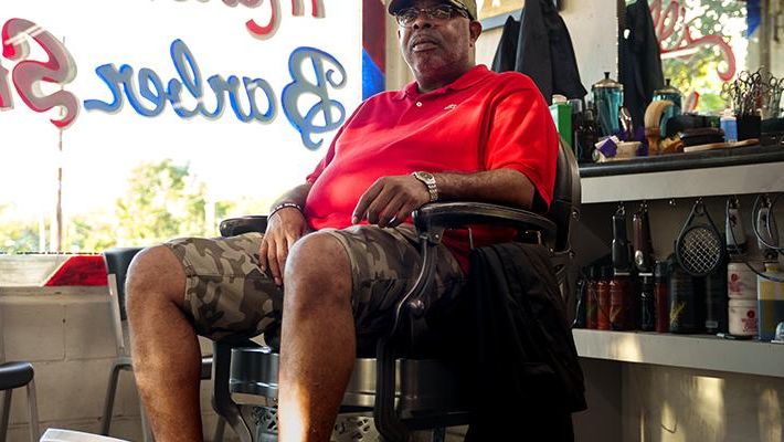 Kevin Asberry at Marshall's Barber Shop on 12th Street. (Steven Hatchett)