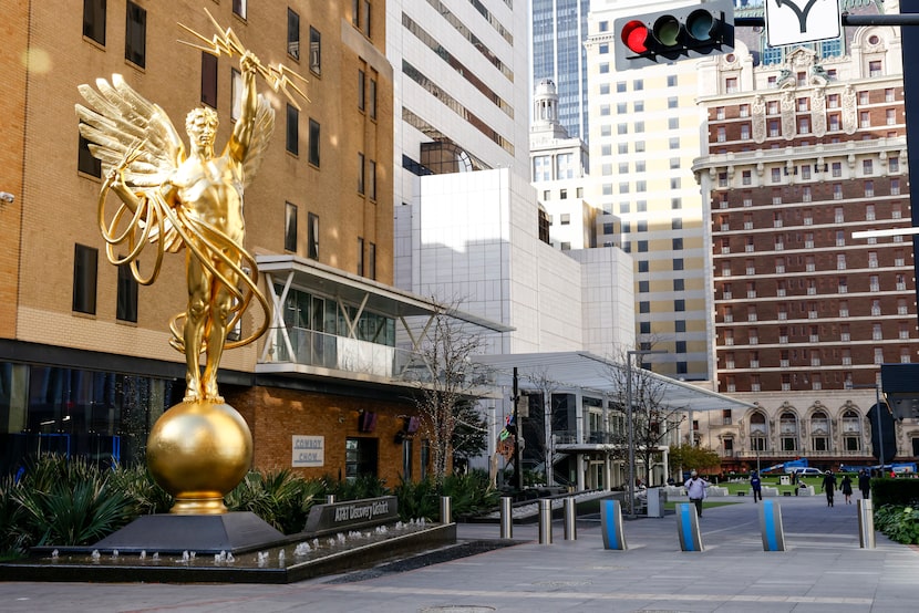 Golden Boy, the Spirit of Communication statue, greets people as they enter the AT&T...