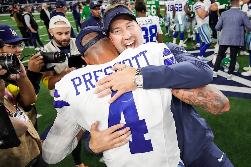Dallas Cowboys head coach Brian Schottenheimer celebrates with quarterback Dak Prescott (4)...