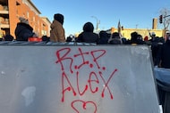 A mattress is spray painted with "R.I.P. Alex" near the site of the fatal shooting of...