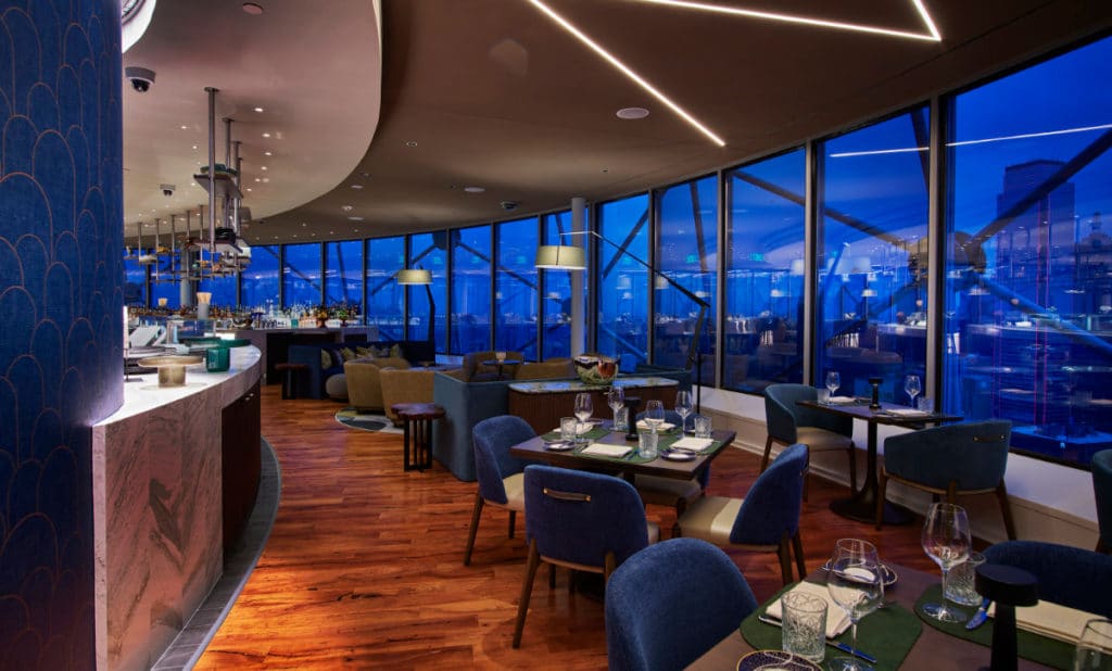 Image showing tables, the bar, and the interior set up at Reunion Tower's new restaurant Crown Block in Dallas