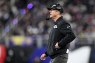 Baltimore Ravens head coach John Harbaugh in action during the first half of an NFL football...