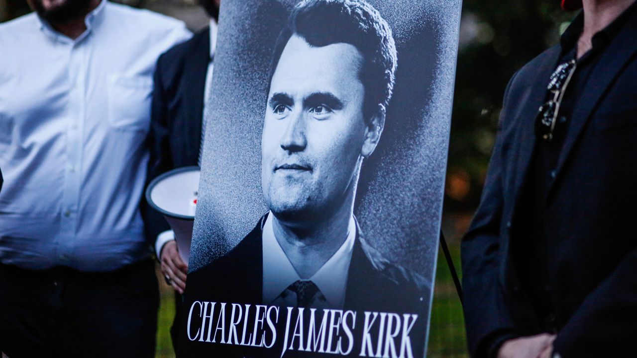The New York Young Republicans Club holds a vigil for Turning Point USA CEO and co-founder Charlie Kirk at Madison Square Park on Friday, Sept. 12, 2025, in New York. (AP Photo/Kena Betancur)