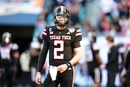 Texas Tech quarterback Behren Morton (2) walks on the field during warmups ahead of the...