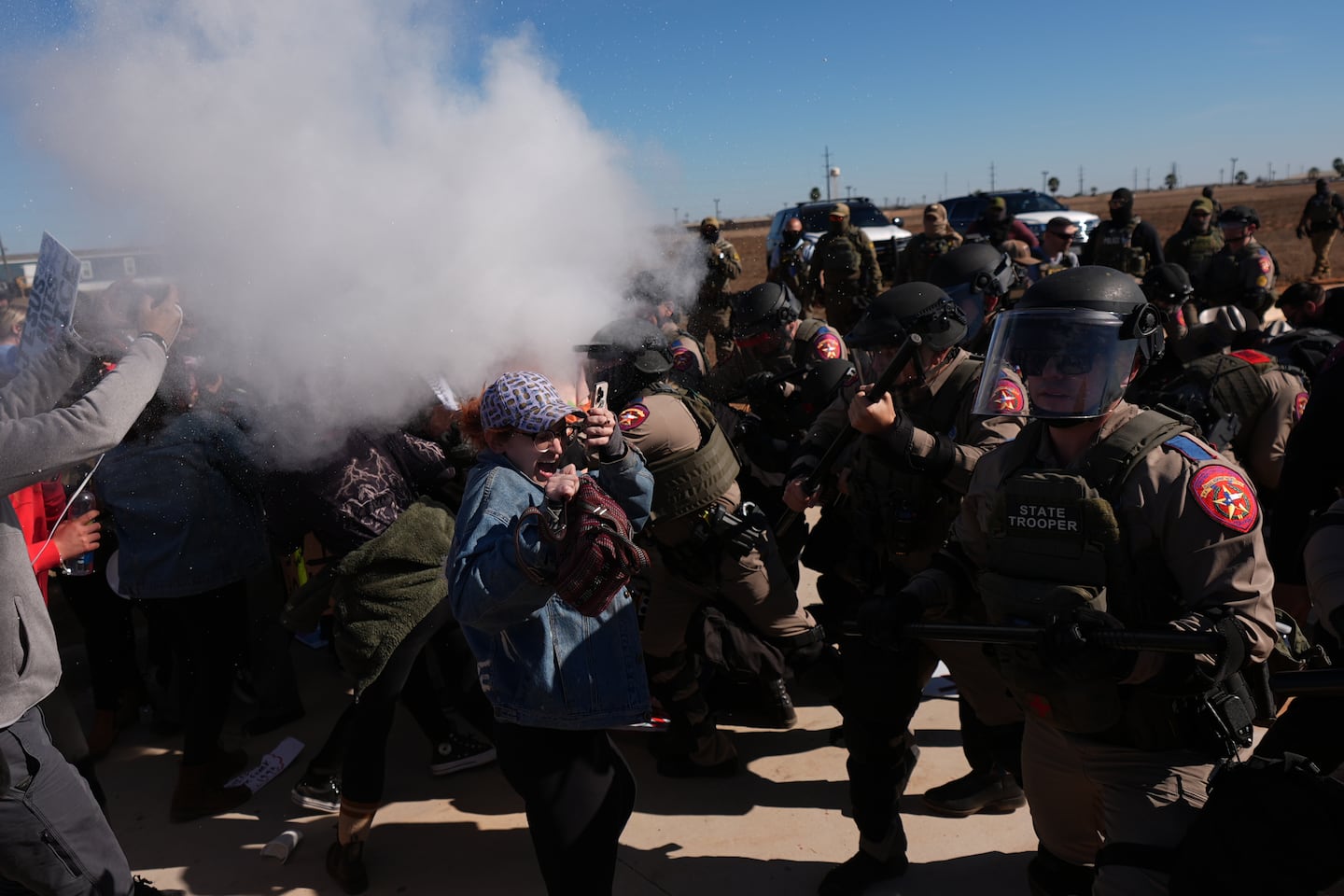 Pepper spray was used by Texas troopers to disperse protesters outside the South Texas Family Residential Center detention facility on Wednesday, where Liam Ramos and his father are being detained in Dilley, Texas.