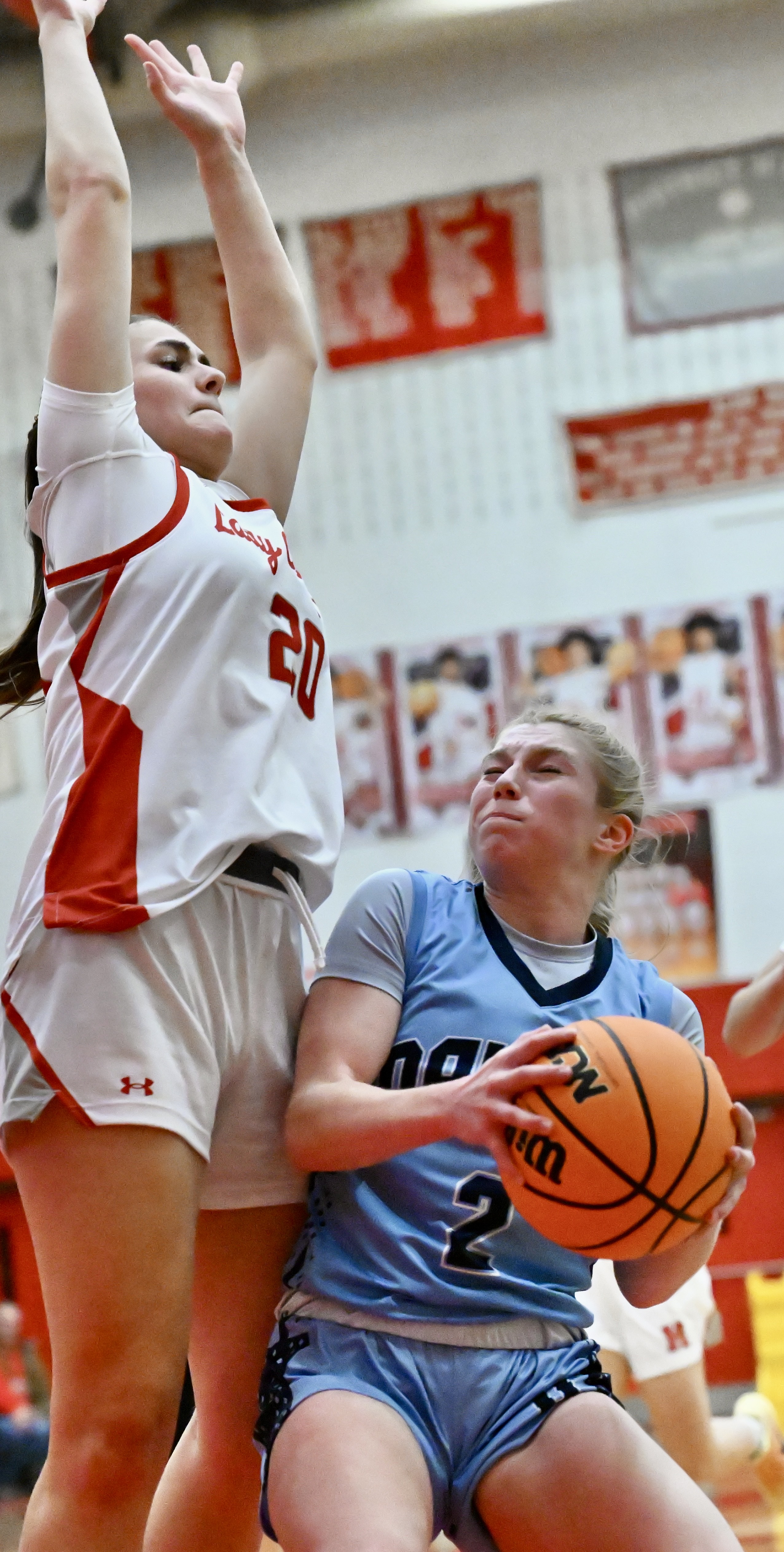 Hazleton Area’s Addy Fritz (20) defends against Dallas’ Caitlyn Mizzer...