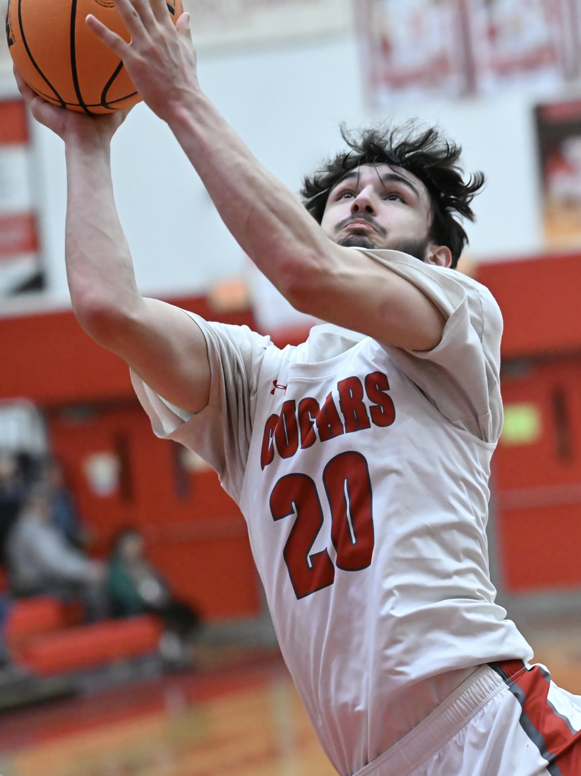 Hazleton Area’s Dylan Stish drives for a layup during the...