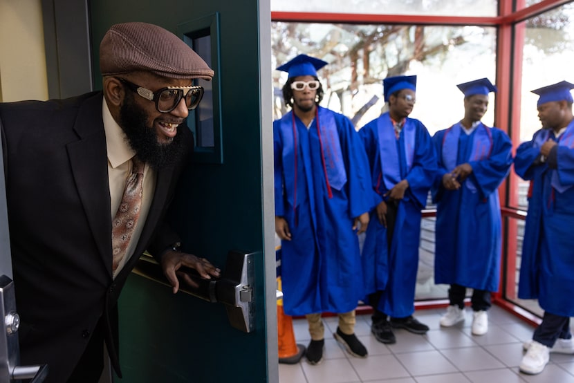 Rev. Andrā Johnson, Cornerstone Career Center executive director, peers around a door and...