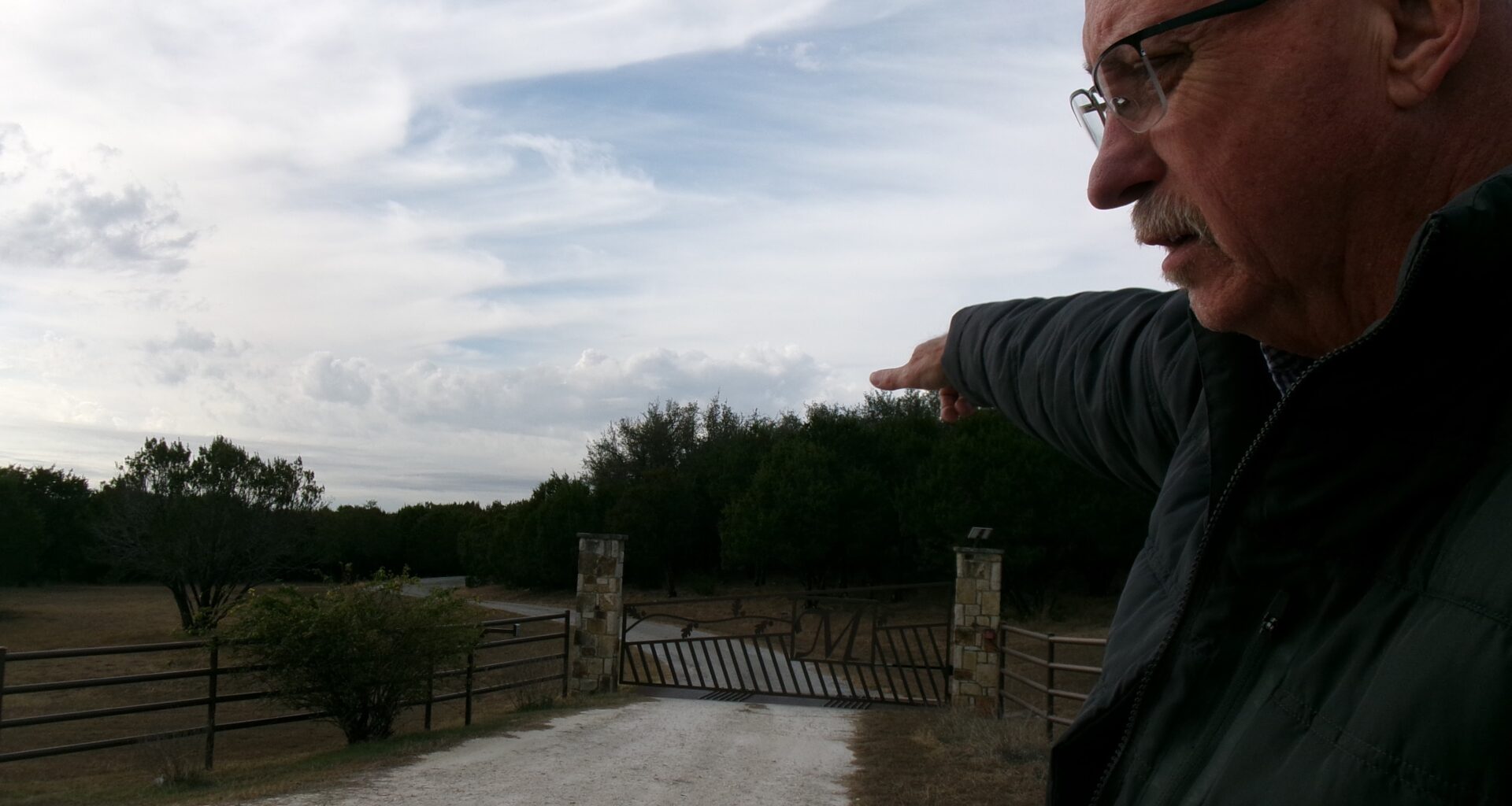 Somervell County Commissioner Jeff Harris shows where a route for a high-voltage transmission line is proposed near Dinosaur Valley State Park. Credit: Arcelia Martin/Inside Climate News