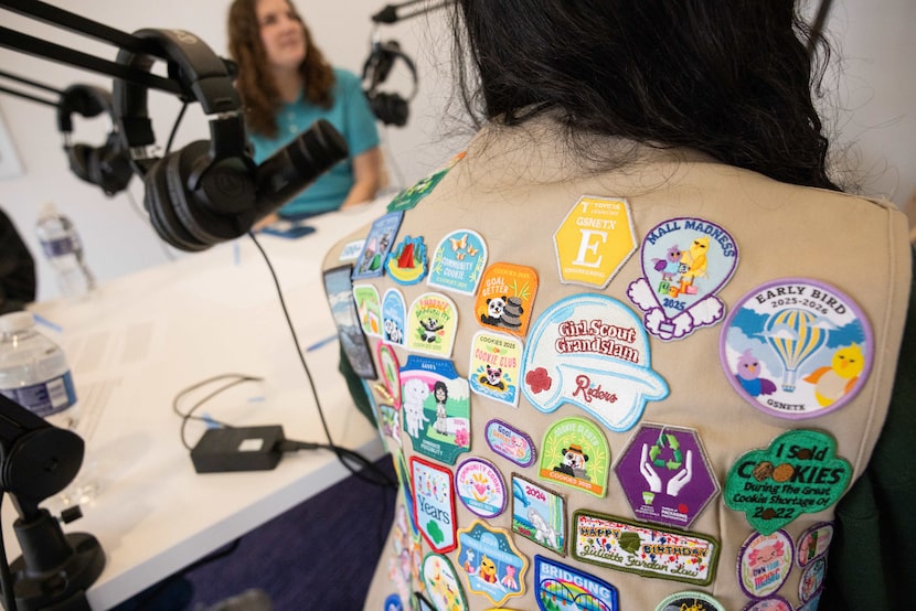 Patches seen on a Girl Scout using the podcast room. 